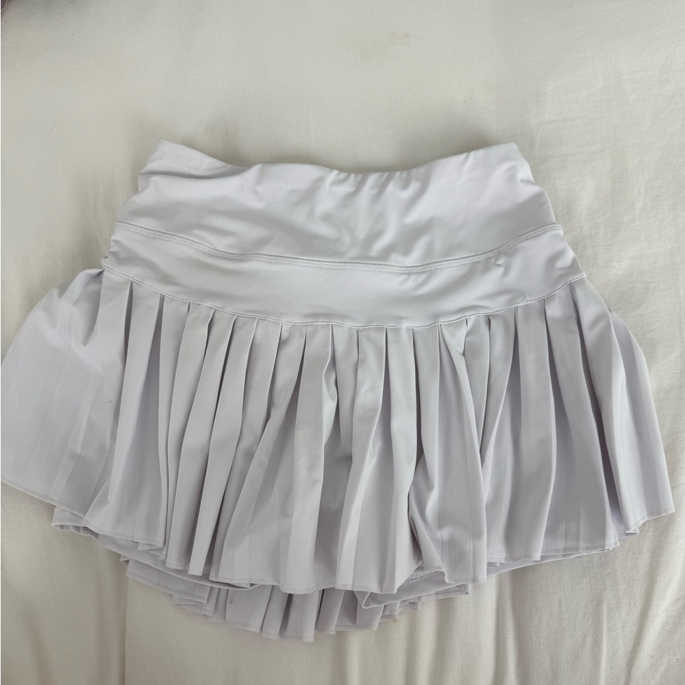 Gold hinge white skirt